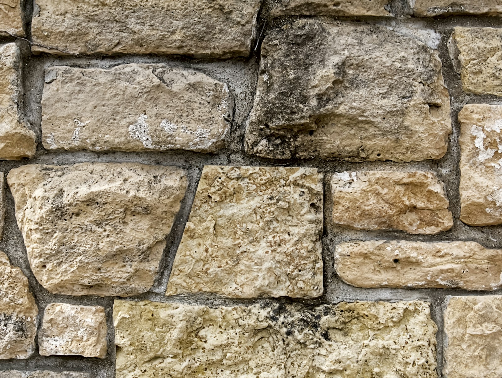 Close-up of a Cotswold stone wall built from dry-laid rocks